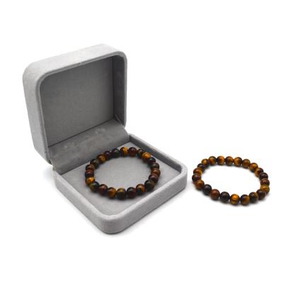 China Trendy Natural 8mm Gemstones Tiger Eye Bracelet Elastic Yoga Healing Energy Men Women Stretch Bracelet for sale