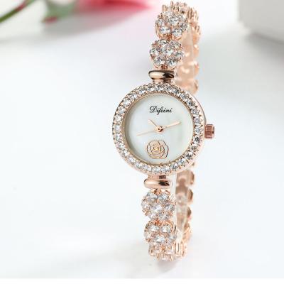 China Fancy Water Resistant Ladies Watch Design Luxury Stone Covered Bracelet Brass Ladies Stainless Steel Wristwatch Good Quality Woman for sale