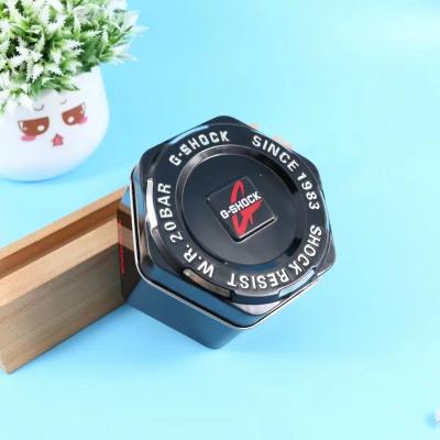 China Casio Tin Watch Box G-Shock Recyclable Current Baby G Shock Around Window Hexagon Metal Watch Box for sale