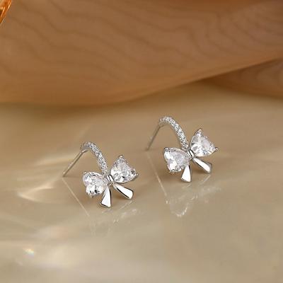 China ANENJERY TRENDY Zircon Bow Stud Earrings For Women Simple Trendy Earrings for sale