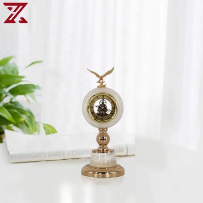 China Fashion antique luxury hot creative white jade light clock metal factory sale style desk clock for home decoration retro crafts for sale