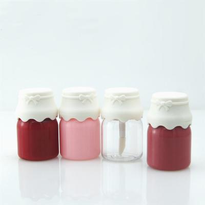 China 8ml cosmetic milk bottle fashionable cute shape without logo lip gloss empty tube in stock for sale