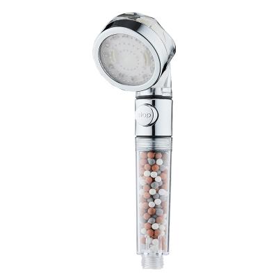 China Without diverter high pressure single function mineral balls filter LED shower head with on&off button for sale