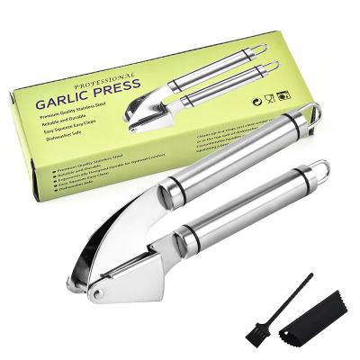 China Viable Professional Amazon Success Home and Kitchen Stainless Steel Garlic Press Kitchen Tool Accessories for sale