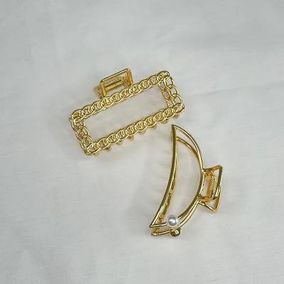 China 2021 simple new hot selling korean shell hair claws gold hair slings star rose hair claw clip for girls for sale