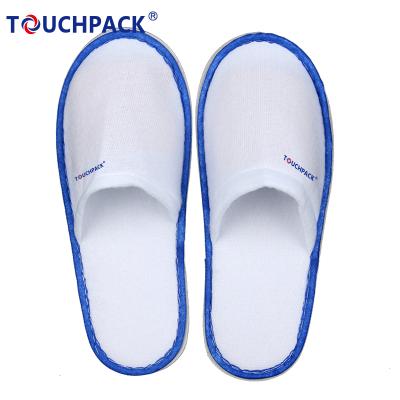 China Fashion Trend Customized Logo Wholesale Hotel Cotton Disposable Disposable Slippers for sale