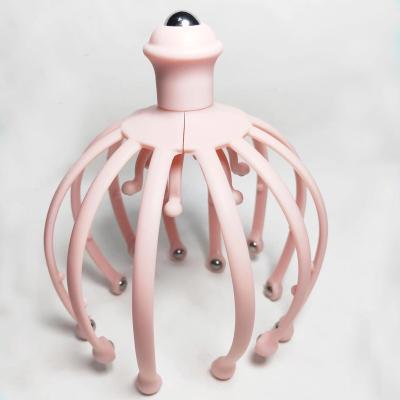 China New Spot Handheld Silicone Head Relaxing Massager Octopus Head Massager for sale