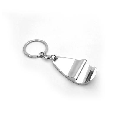 China Creative Drip Shape White Beer Bottle Opener Key Chain Oval Zinc Alloy Wall Opener Viable Wholesale for sale