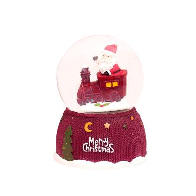 China Custom Home Souvenir Gift LED Light Water Snow Globe DIY Logo Resin Small Carousel Christmas Decoration for sale