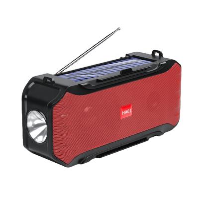 China Phone Function Speaker Support USB TF MP3 FM Wireless Radio Player With Solar Powered Charger for sale