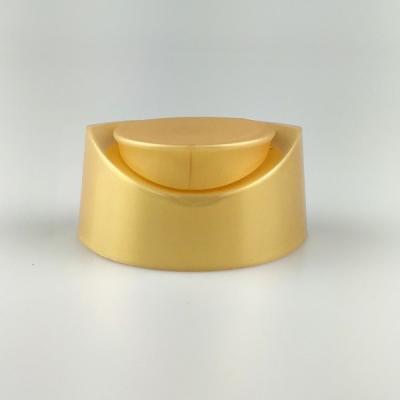 China Non Spill Plastic Snap Gold Oval Flip Top Cap For Shampoo Bottle for sale