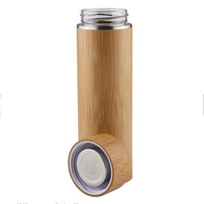 China Sustainable wooden and glass water bottles, with nature bamboo and wooden sleeve, water proof leakage for sale