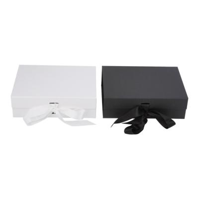 China Recyclable Customizable Collapsible Black Paper Packing Box Boutique Packing Boxes for sale