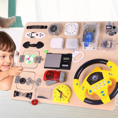 China Wooden Edition-Steering Busy Wheel Wooden Children's Busy Board Open Steering Wheel Multifunction 27 in 1 Busy Board Toy for sale