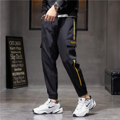 China 2021 Anti-wrinkle trends men's streetwear side pockets drawstring sports panties cargo pants for men for sale