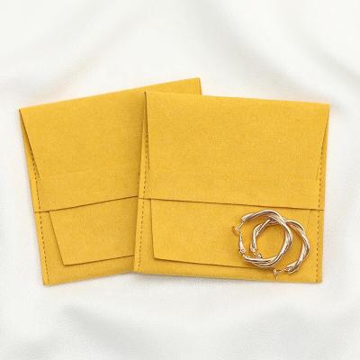 China Embossed Envelope Design Flap Microfiber Jewelry Pouch Dust Bag Eco-friendly Custom Drawstring Microfiber Jewelry Pouch for sale