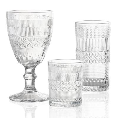 China Viable price diamond pattern glass cup engraved cup center glassware set pilsner drinking glass for sale