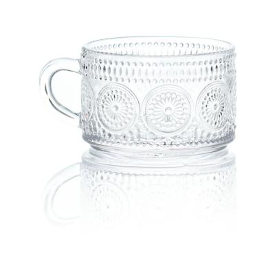 China CLASSIC hot sale Europe sun flower pattern style embossed clear glass home use glassware press production for sale