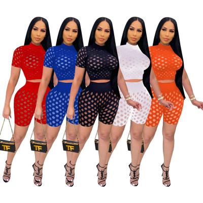 China Xilan XL0023 Summer Breathable Women Colors Mesh Net Broken Holes Breathable Shorts Women Clothing Two Piece Set for sale