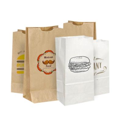 China Recyclable Wholesale Custom Print Logo Kraft Paper Shopping Bag Customized Food Packaging Bag for sale