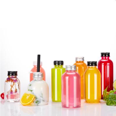 China Beverage 400ml Clear Beverage / Milk Tea / Juice Glass Bottle With Aluminum Cap for sale