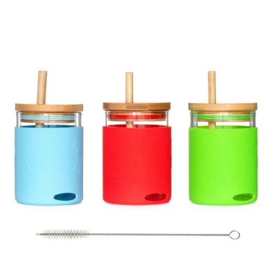 China Glass Beverage Kids Toddler Cups With Protective Silicone Sleeves And Straw for sale