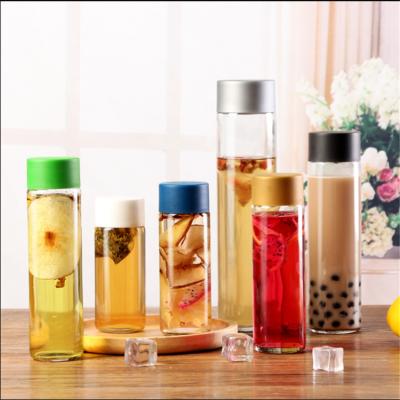 China 500ml Beverage Sealed Tea / Coffee Juice Cold Glass Water Bottle With Plastic Lid for sale