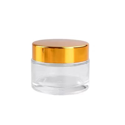 China Personal Care Empty Clear Frosted Glass Cream Jar With Gold Silver Lid Glass Bottle For 100ml Sugar Cream Packaging for sale