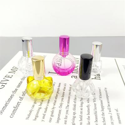 China Luxury Cosmetic Atomizer Spray 10ml Hot Selling Empty Glass Round Shaped Perfume Bottles for sale