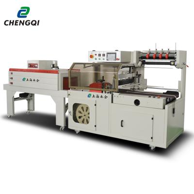 China GARMENT Automatic Side Shrink Wrapper Sealing Packing Machine for Cake Box for sale