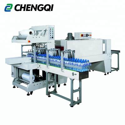 China CLOTHING Automatic PE Film Sleeve Bottle Shrink Packaging Machine for sale