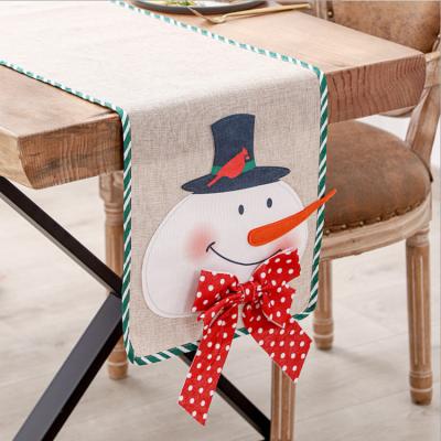 China Chirstmas Decor Storing Large Bow Santa Snowman Christmas Tapestry For Party Place Mat Table Runner Christmas Indoor Home Woven Canvas Decor for sale