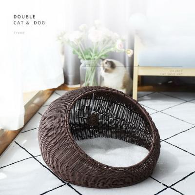 China Cute Durable Travel Pet Bed Hand Made Round Rattan Cat Beds With Breathable Mat for sale