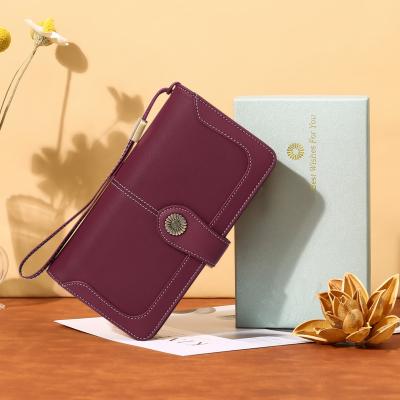 China New Style RFID Blocking Large Capacity Clutch Purse Women Leather Wallet With Wrist Strap for sale