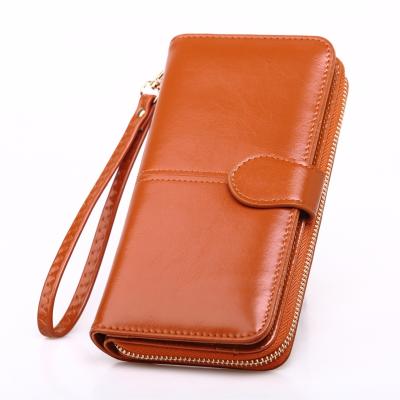 China Latest Fashion RFID Ladies Long Zipper Mobile Phone Clutch Wax Female Purse Leather Card Wallet Women for sale