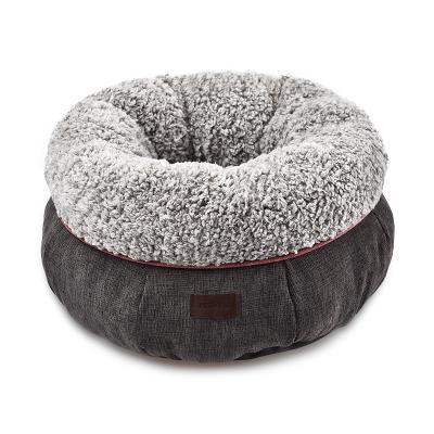 China Winter Wholesale Self-heating Warm Round Donut Heater Petstar Cloth Pet Nest Passionate Dog Cat Bed for sale