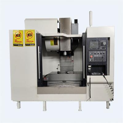 Cina 4 axis 3 axis milling alloy wheel vertical machining center VMC in vendita