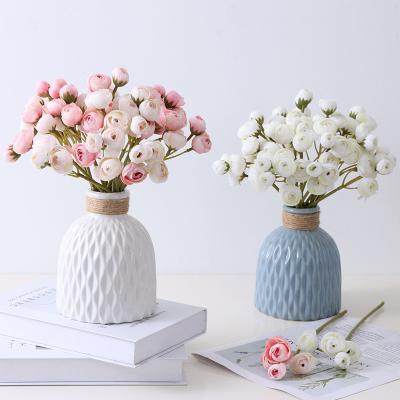 China High Quality Natural Camellia China Artificial Mini Lotus Bouquet Small Tea Grain Touch Flower Home Decoration Rose for sale