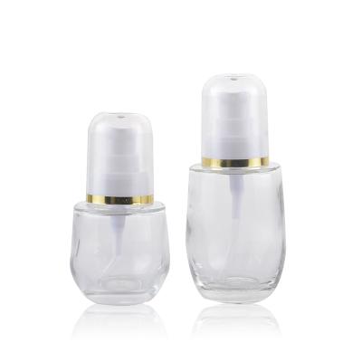 China Personal Care OEM Factory 30ml 50ml Body Squeeze Lotion Glass Bottle With Pump for sale