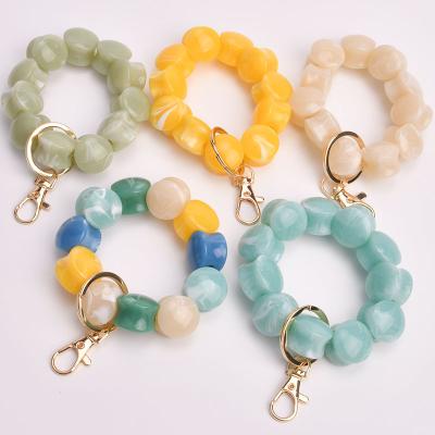 China Key Chain Bracelet Acrylic Key Chain Bracelet Candy Color Acrylic Beads Key Chain Gift for Girls Women for sale