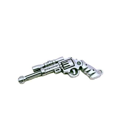 China FASHIONABLE XUE YI Factory Alloy Pendant Gun Key Chain Pendant for sale