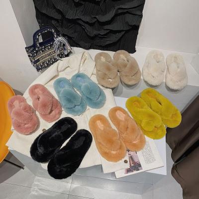 China Cross line fashion one fashion plush slippers women's wear soft home slippers new fashion plush flat bottom slippers for sale