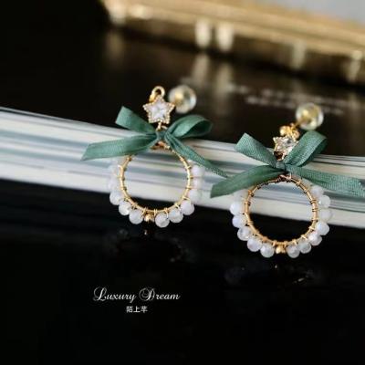 China CLASSIC Korean Temperament Moonstone Bow Earrings Net Red Earrings Circle Flower Earrings for sale