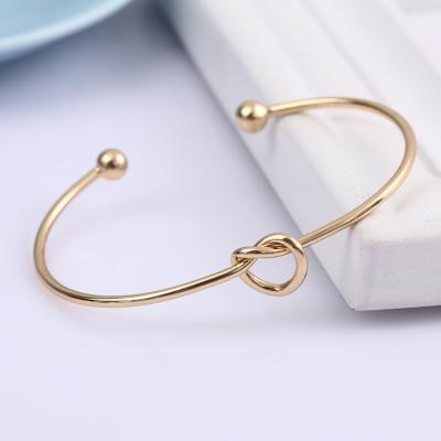 China European and American thin four-leaf clover metal heart-shaped open bracelet casual/sporty simple and flexible ladies bracelet for sale