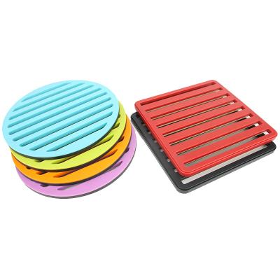 China Sustainable Restaurant dining table color square round hollow anti-scalding coaster silicone table heat insulation mat for sale