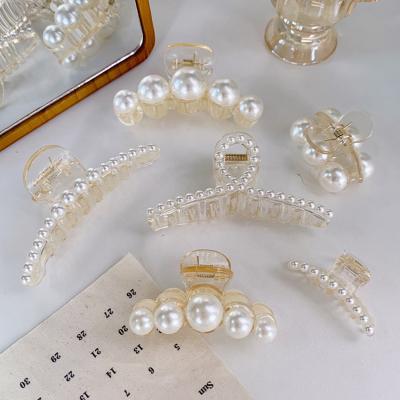 China Big small claw hair clip pearl hairpin hair claw headdress girl swim back main Korean environmental friendly claw clip for sale