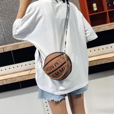 China New high quality designe creative basketball shoulder bag round shape ladies cross - body bags arcylic basketball small chain purses and purse for sale