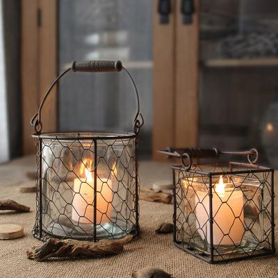 China Home Wrought Iron Retro Dinner Table Decoration Coffee Color Candle Holder Minimalist Pastoral Wind Lamp for sale