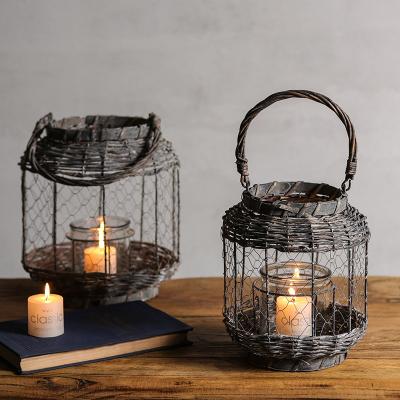 China Retro Minimalist Nordic Pastoral Wind Lamp Wrought Iron Dinner Table Decoration Home Rattan Candle Holder for sale