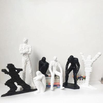 China Common home decoration resin crafts ornaments living room mosaic figures home black and white people personalized decoration ornament for sale